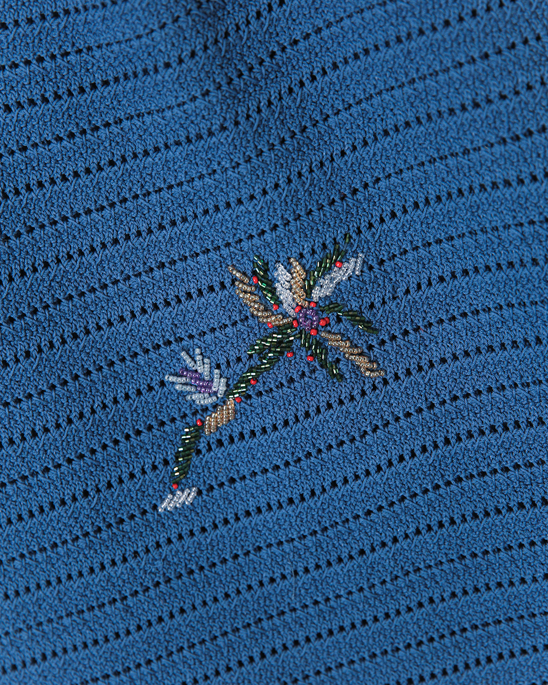 In a crochet pattern woven one stitch at a time<br> Handmade Tote with Beads
