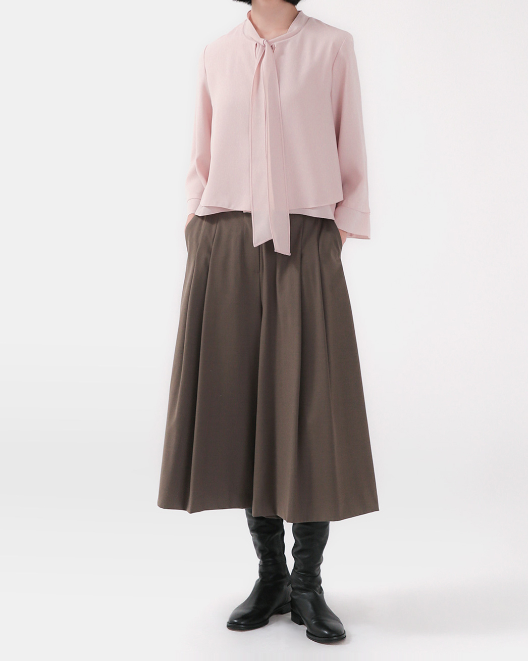 Delicate sophistication, softly flowing silhouette<br> graceful tie flare blouse
