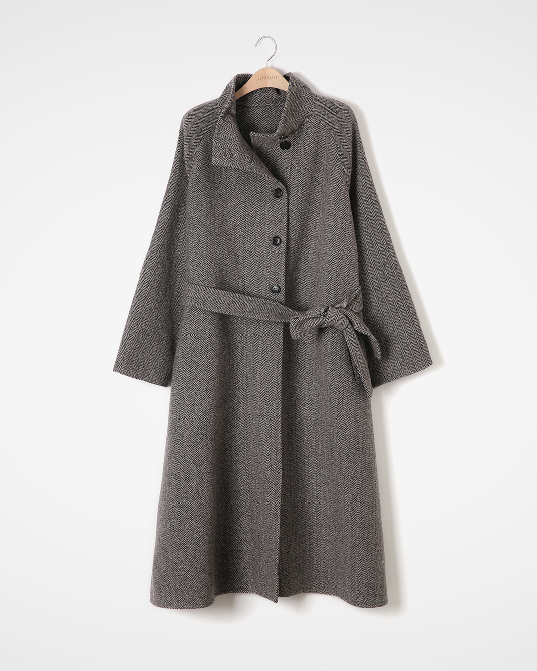 The warmth of herringbone texture and carmel blend<br> herringbone camel-blend wool coat