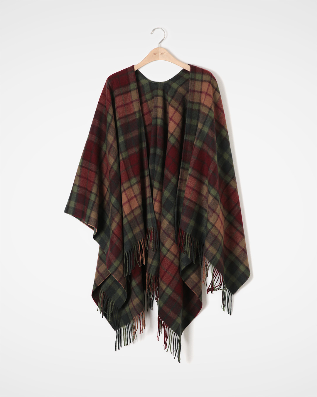 The romance of classic checks, like warm air<br> brushed wool check poncho
