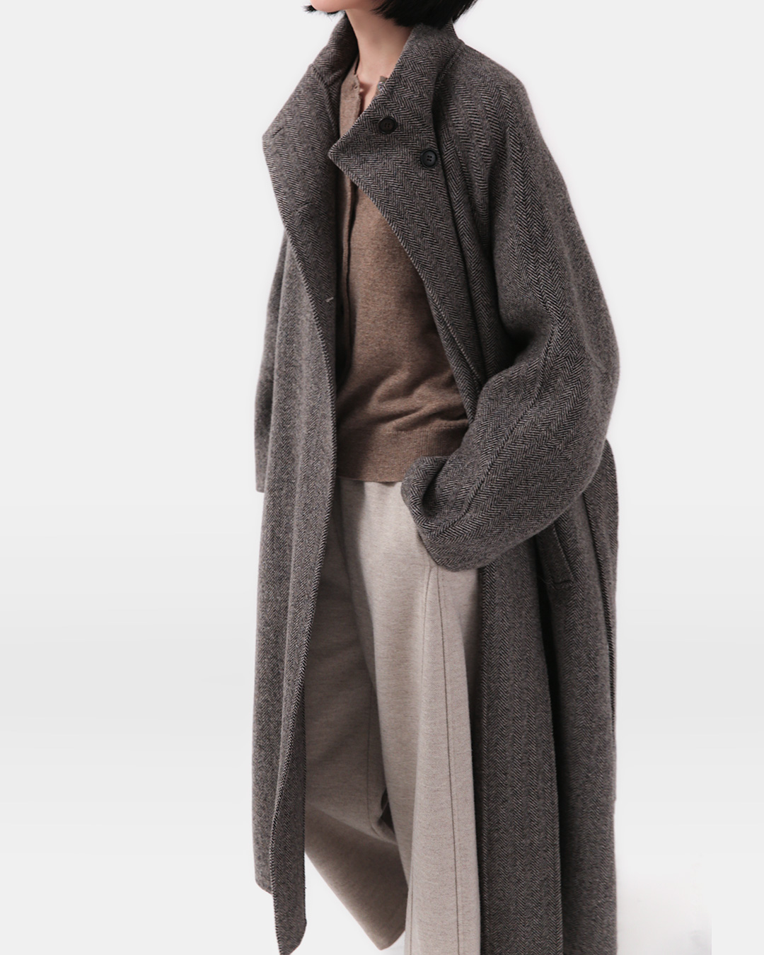 The warmth of herringbone texture and carmel blend<br> herringbone camel-blend wool coat