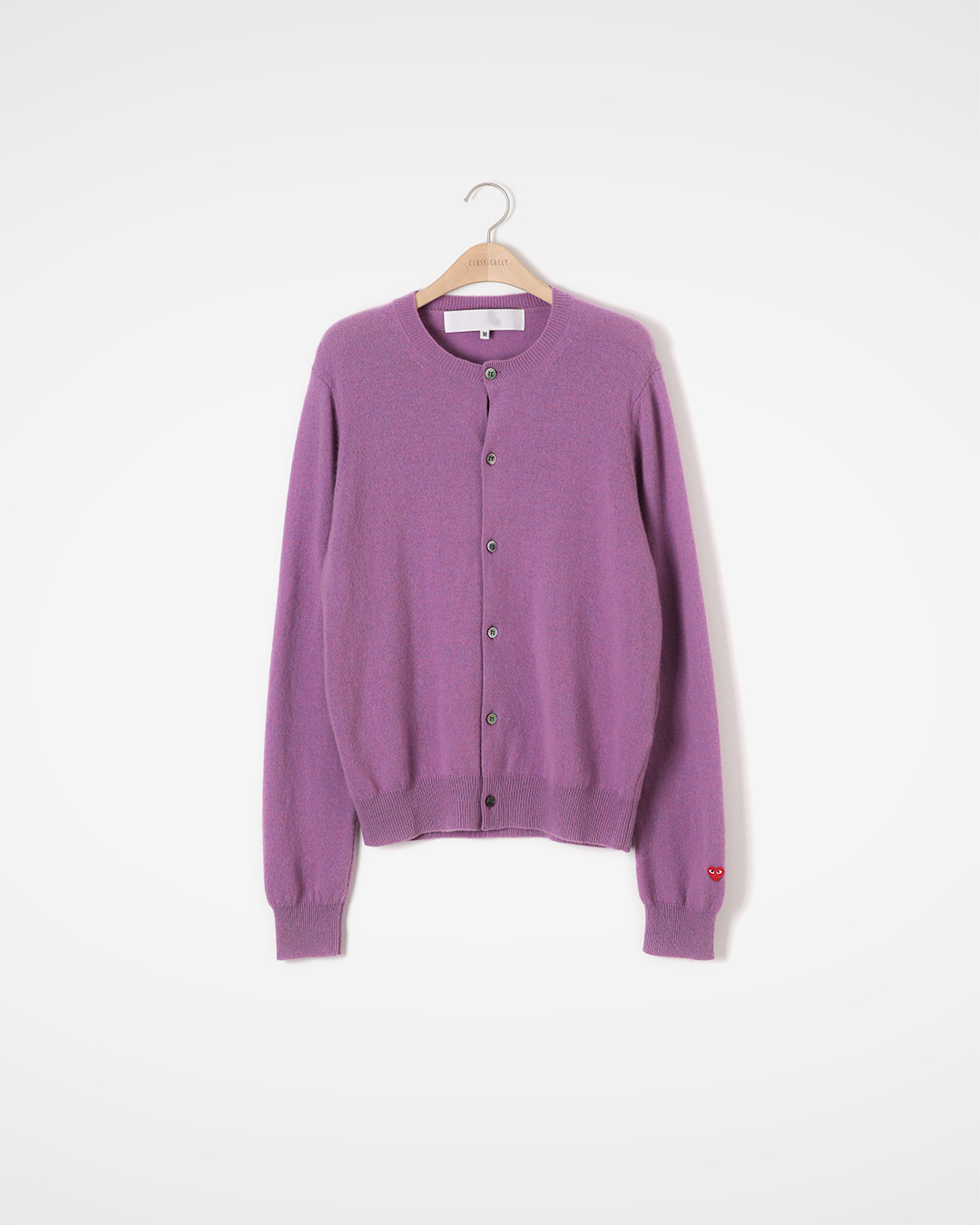 A balance between warmth and neatness<br> pure wool round cardigan