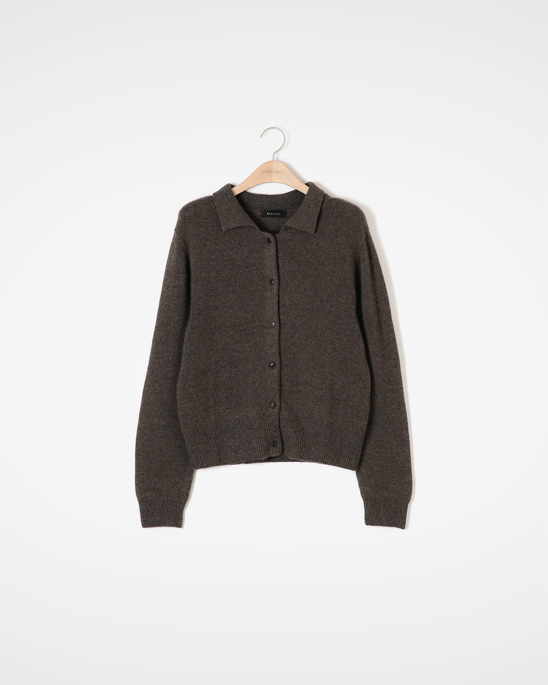 Adding loveliness to neatness<br> Kara Cardigan's mood changes