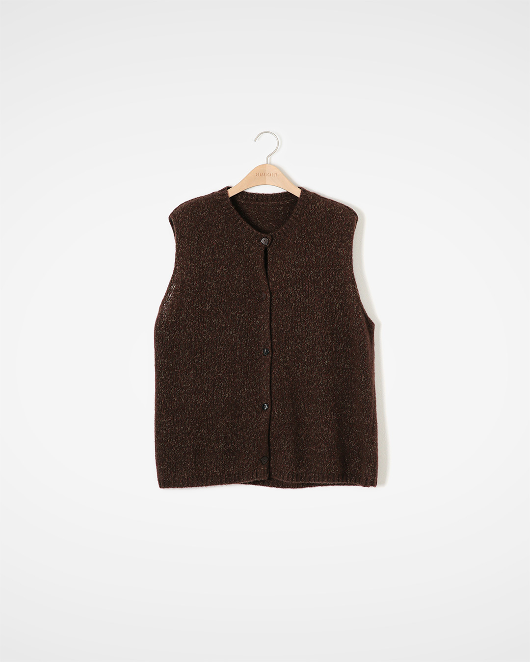 A Fold that adds depth to the soft melange<br> pure wool melange knit vest