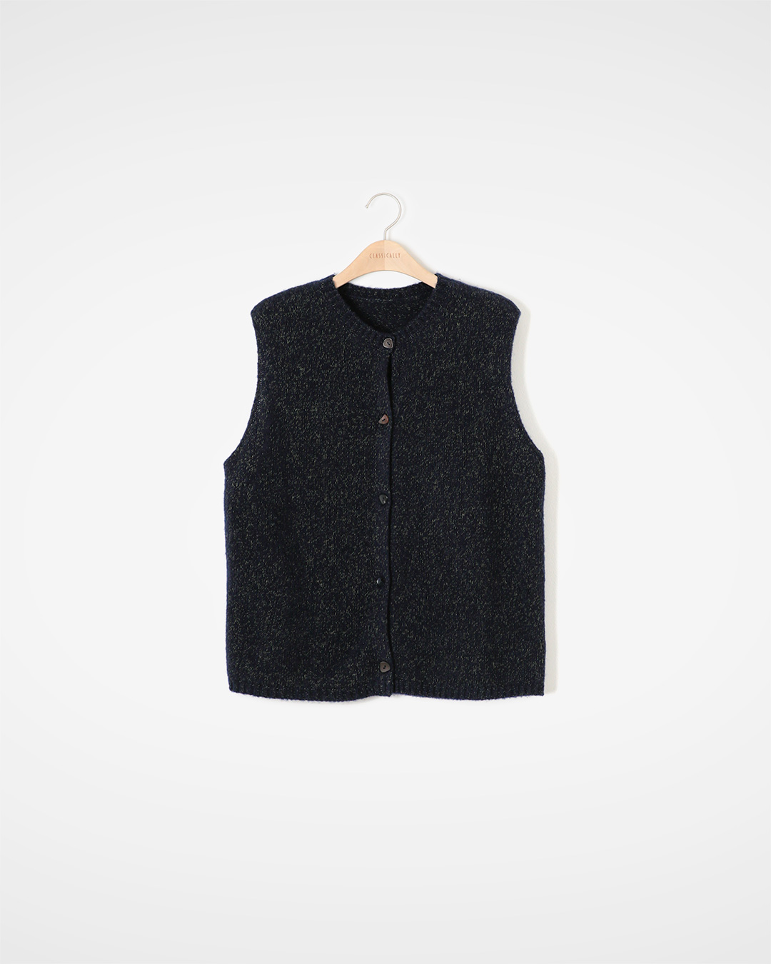 A Fold that adds depth to the soft melange<br> pure wool melange knit vest