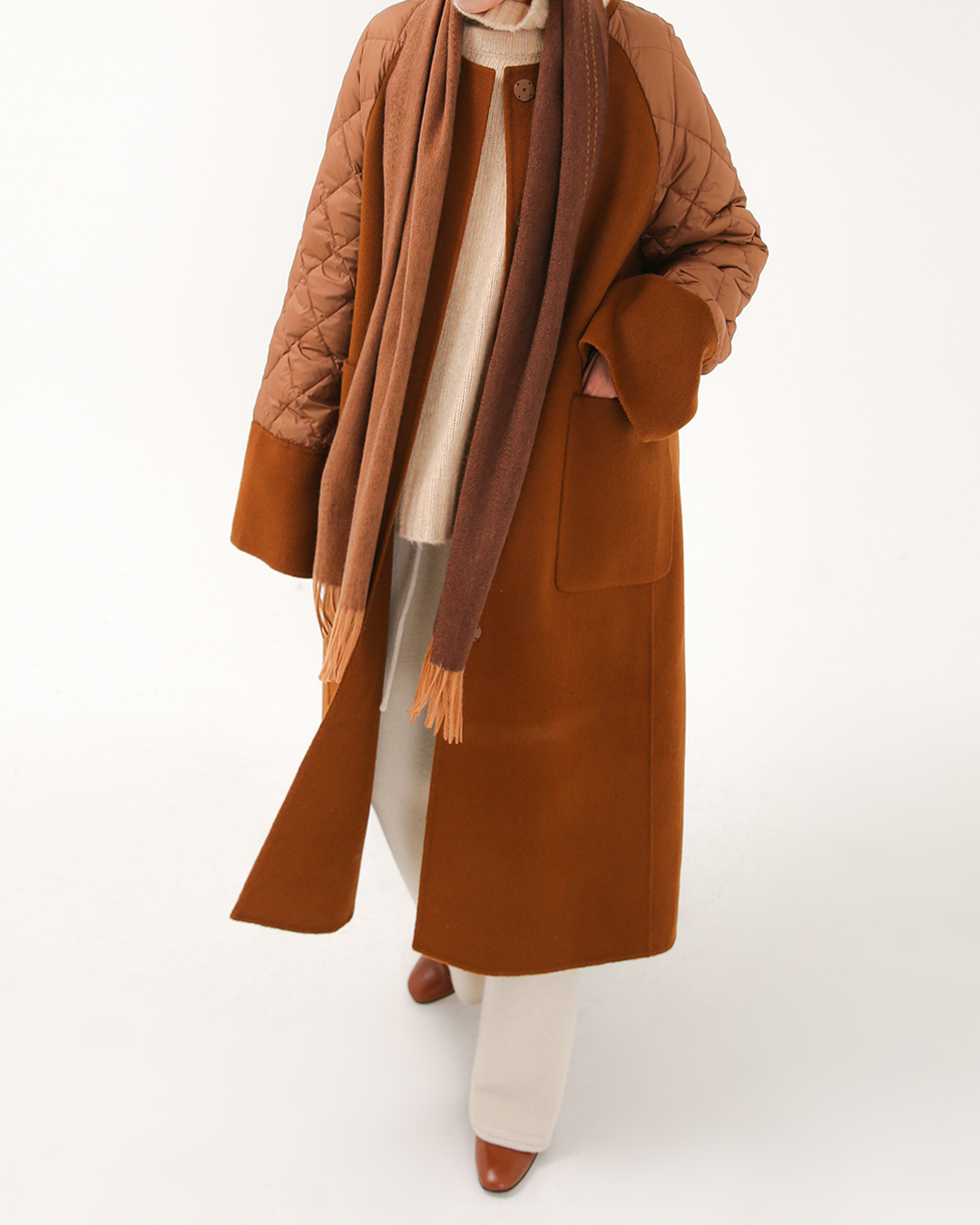 Complete your winter look with quilted<br> mixed cashmere down coat