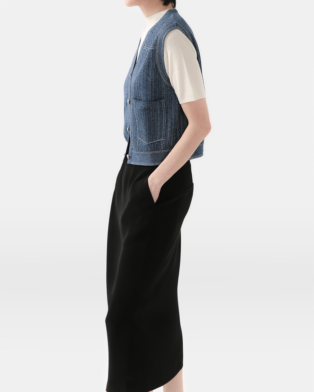 Both practicality and wit<br> Denim Knit Vest