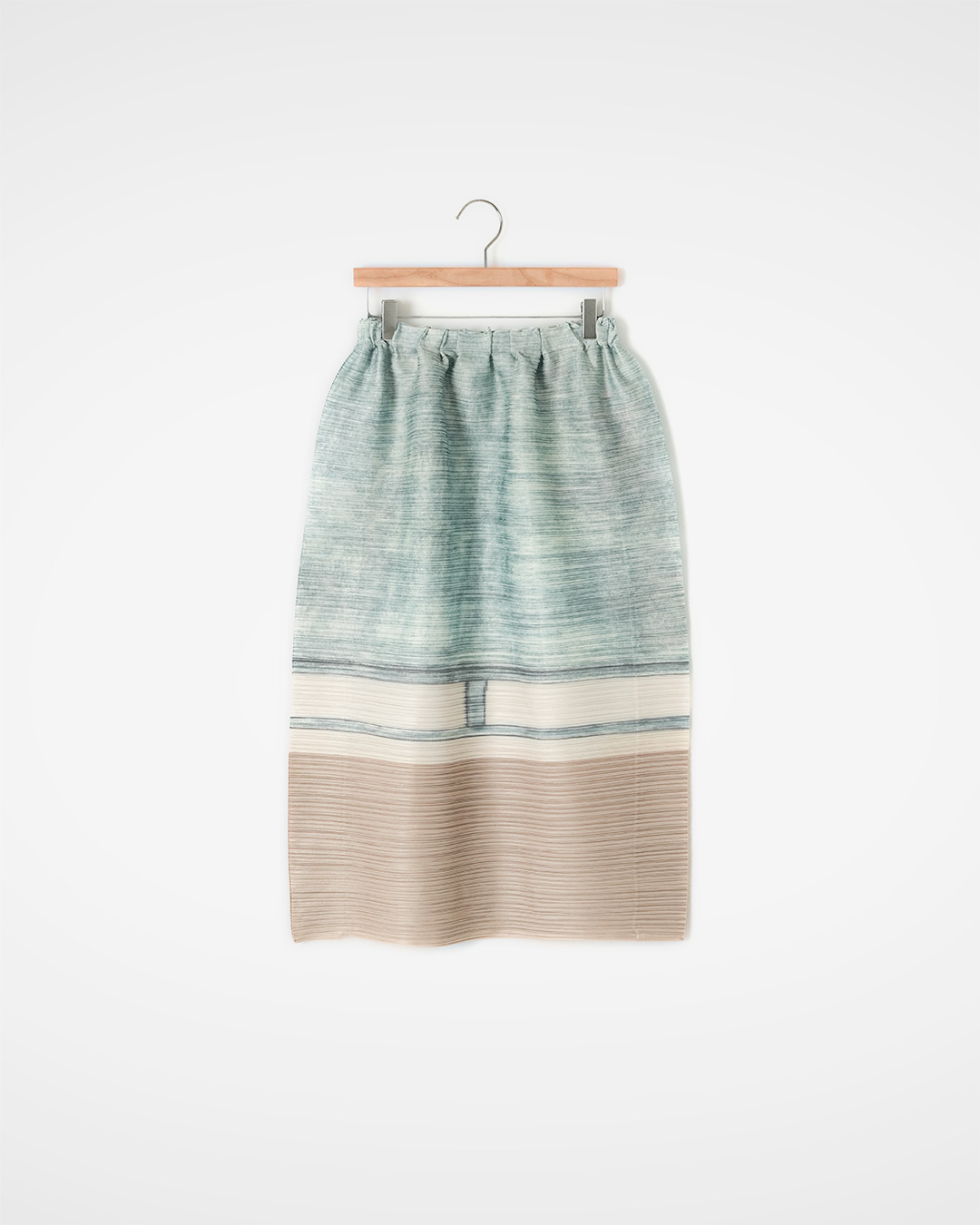 A touch of summer completed with subtle colors<br> Sage Beige Color Block Pleated Skirt