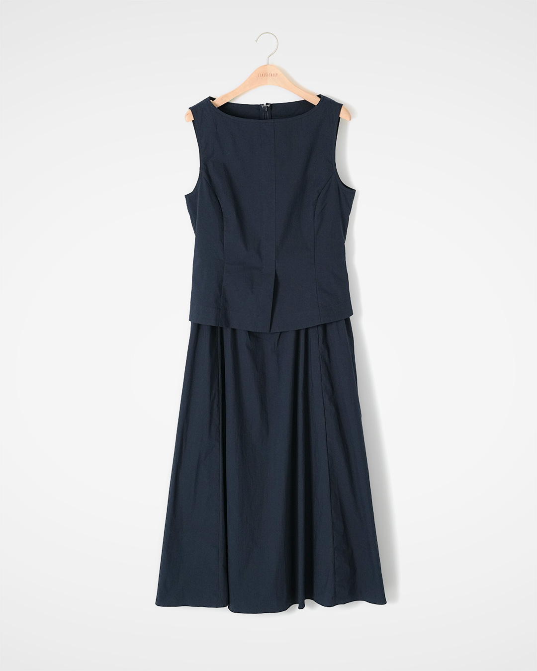 A day completed like a setup<br> Navy Boatneck Poplin Dress