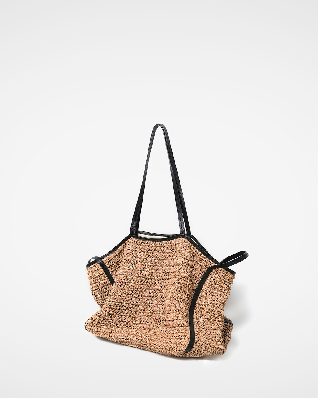 Classically's recommendation is this.<br> leather trimmed raffia tote bag