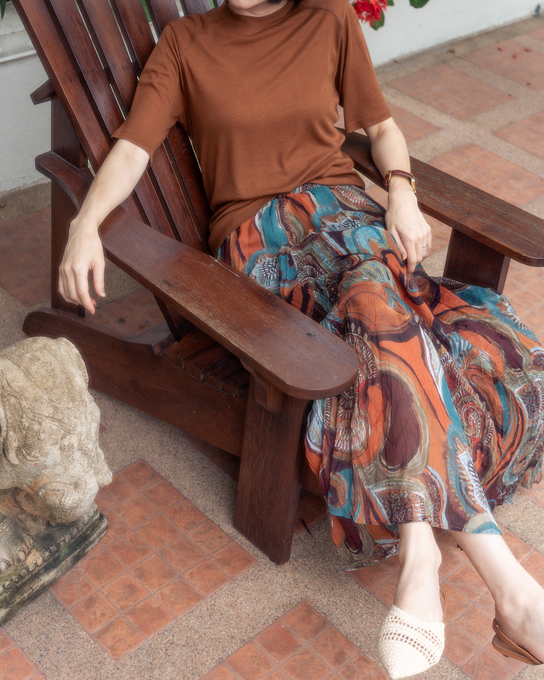 It becomes the centerpiece of the look even when paired with a simple top.<br> painterly sheer pattern skirt