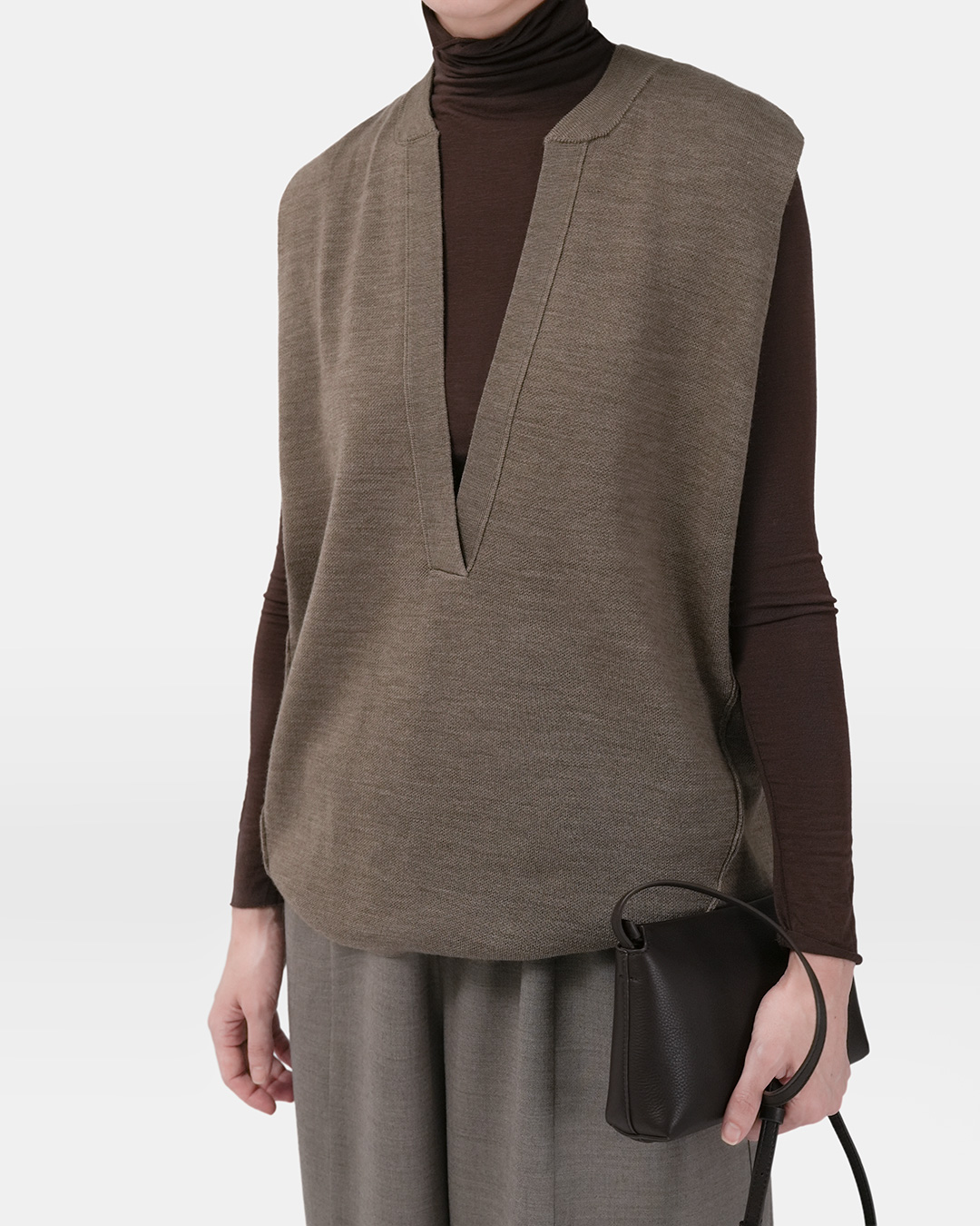 Because just one more layer is enough.<br> Pure Wool Deep V-Neck Vest