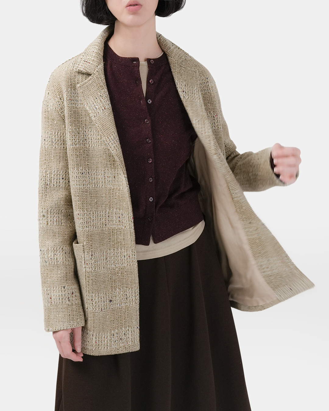단정한 테일러링 위에 특별한<br> 텍스처를 더한 Wool Tweed 재킷
