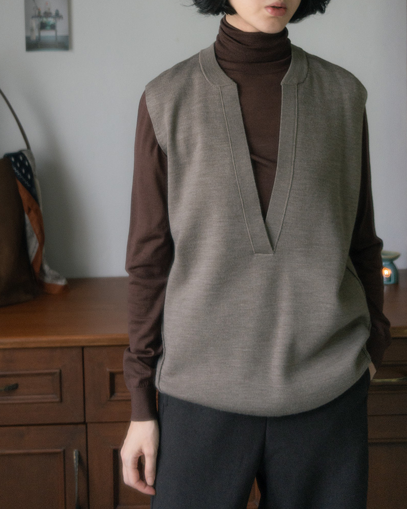 Because just one more layer is enough.<br> Pure Wool Deep V-Neck Vest