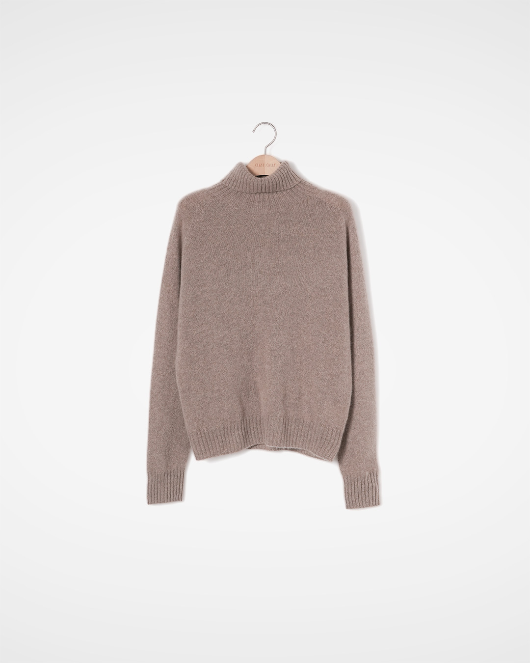 Go to work, but don't leave the warmth behind<br> 100% Cashmere Turtleneck Knit